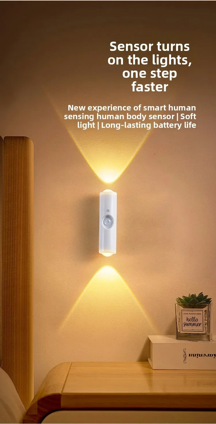 A white sensor light fixture mounted on a wall, illuminating the area with a warm glow.