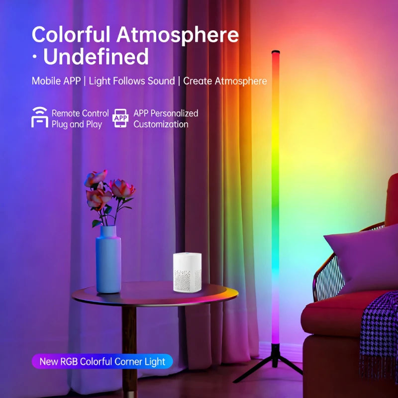 A colorful LED RGB corner floor lamp illuminates a room with ambient light and sound reactive effects.