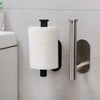 A stainless steel self-adhesive toilet paper holder mounted on a white wall.