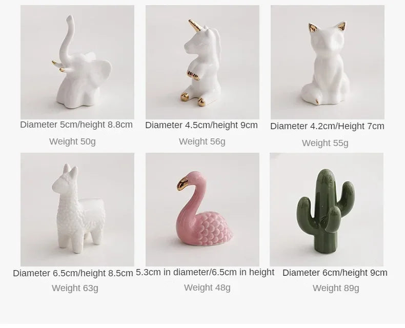 A collection of handcrafted ceramic elephant and rabbit jewelry holders and desk ornaments in various sizes and colors.