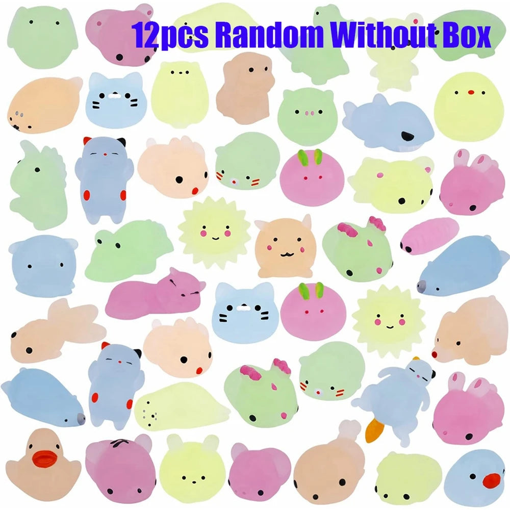 A collection of 12 random glow-in-the-dark kawaii animal squishies in various pastel colors and shapes.