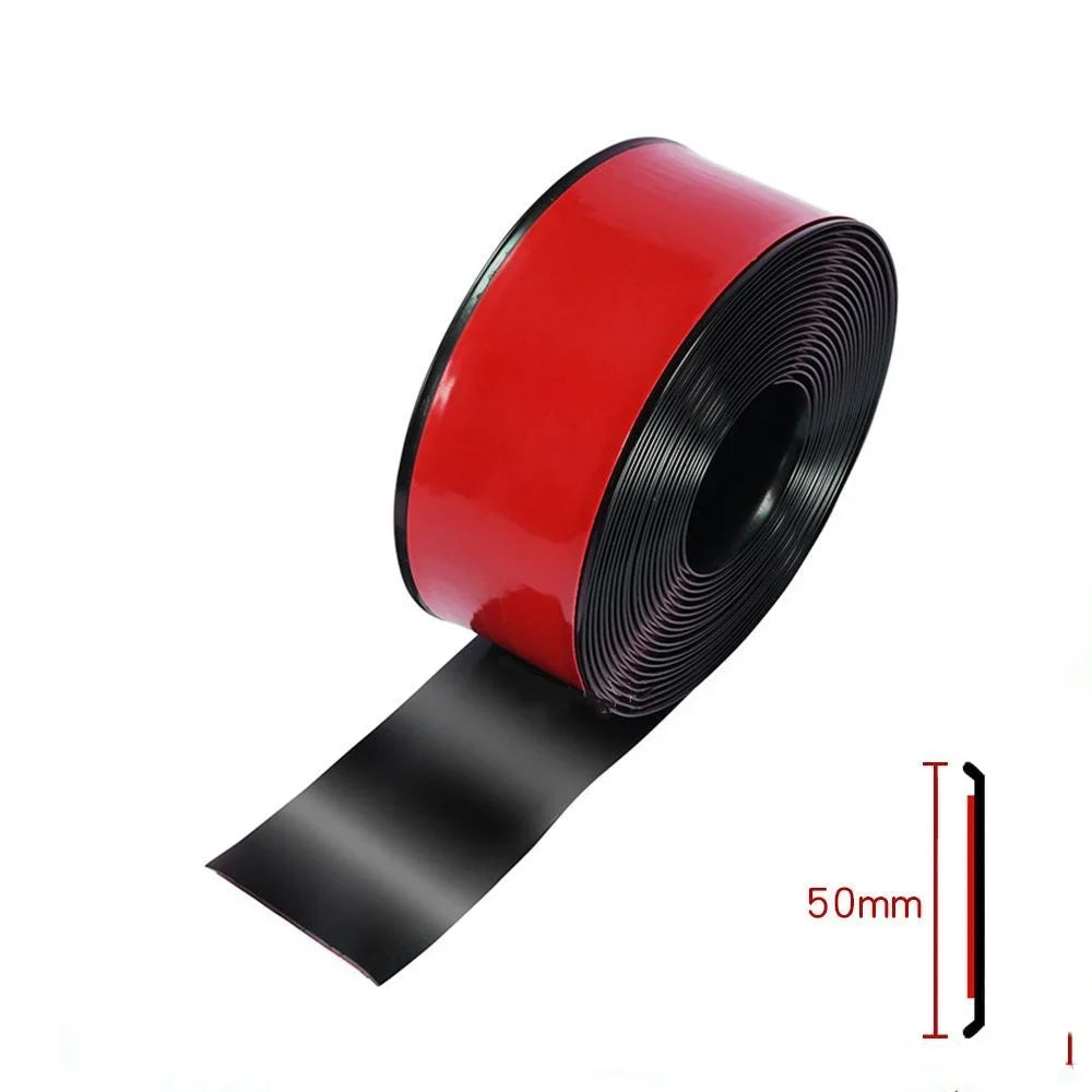 Red and black self-adhesive car door edge protector strip rolled up for automotive use