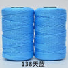 Two spools of bright blue 3-ply polyester knitting yarn for crochet and hand crafts