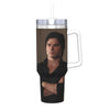 A stainless steel tumbler with a straw lid featuring a portrait of a man.