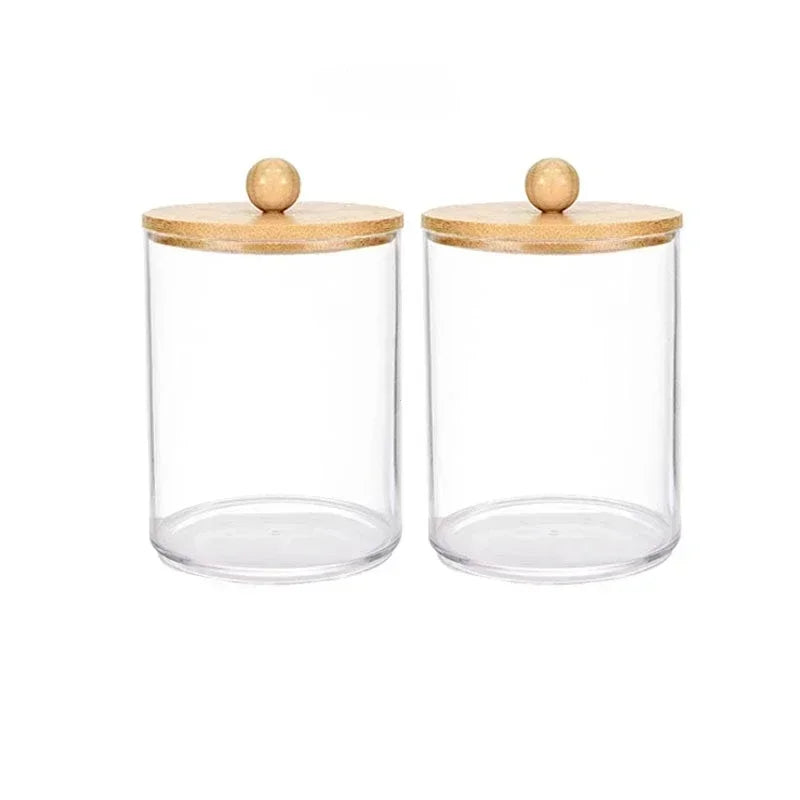 Clear acrylic apothecary jar with a wooden lid