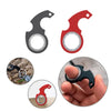 Three soft foam sports stress balls in black and red colors shown in various forms.