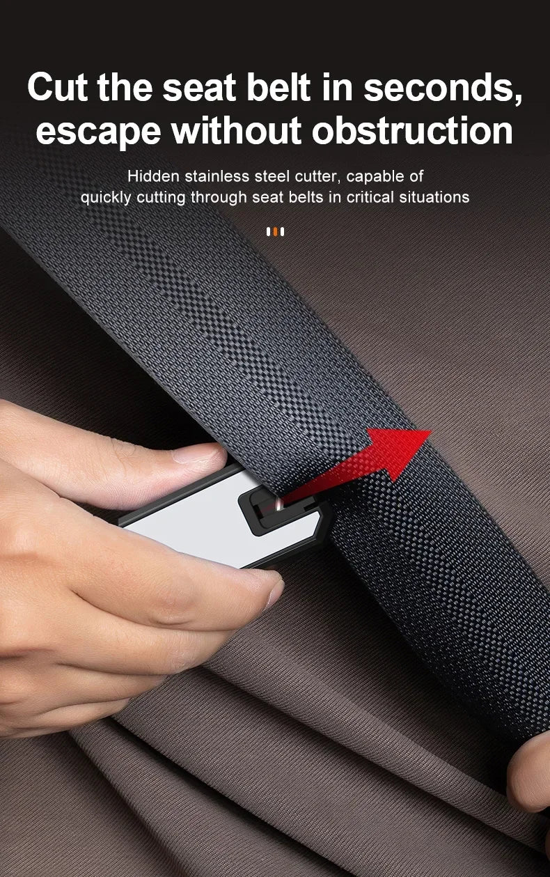 A hand is using a hidden stainless steel cutter to cut through a seat belt in a fabric, demonstrating an emergency tool.