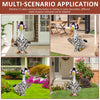 A black and white patterned goose costume with pink accents is shown in various outdoor settings.