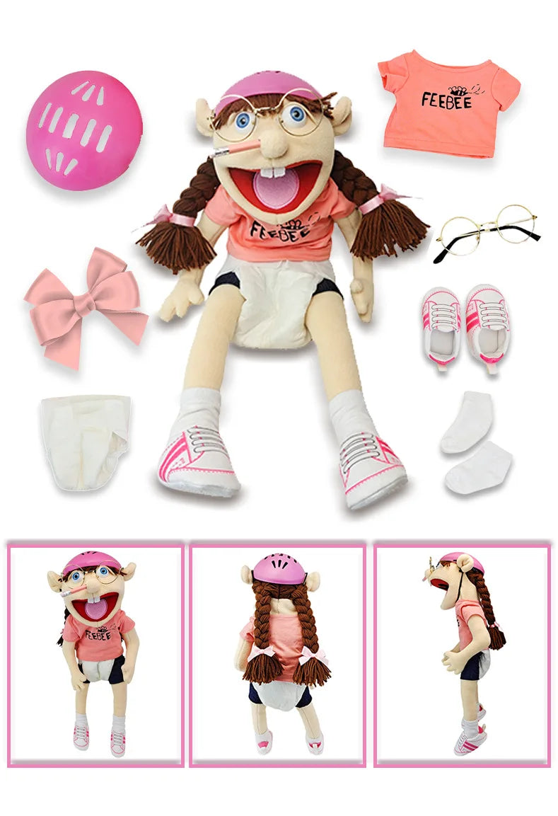 A soft plush collectible toy of a zombie boy hand puppet with pink hair and an open mouth.