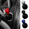 Three different colored aluminum engine start button covers shown in various angles