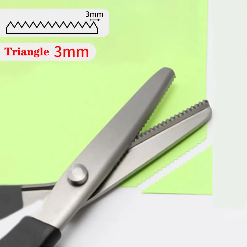 Stainless steel pinking shears with a 3mm triangle pattern shown on a green background
