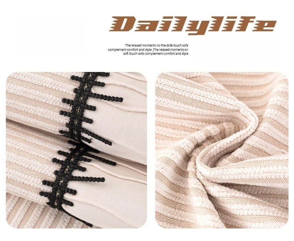 Close-up of a beige striped chenille sofa cover with a black pleated hem detail.