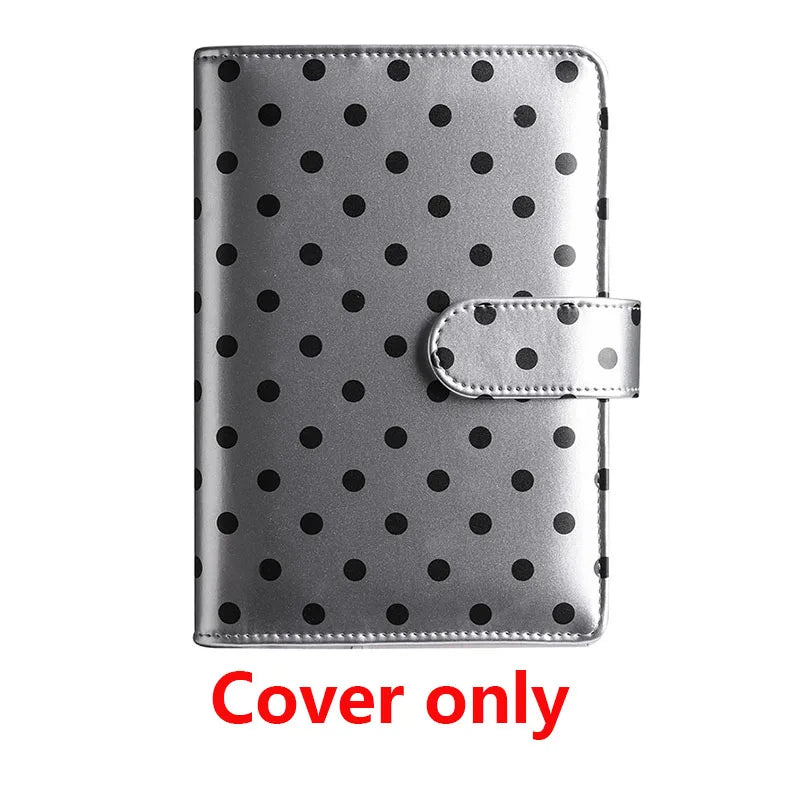 Silver polka dot PU leather binder wallet with a snap closure and cash envelopes