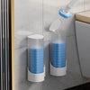 A wall-mounted disposable toilet brush set with a blue brush and holder is displayed on a gray tiled wall.