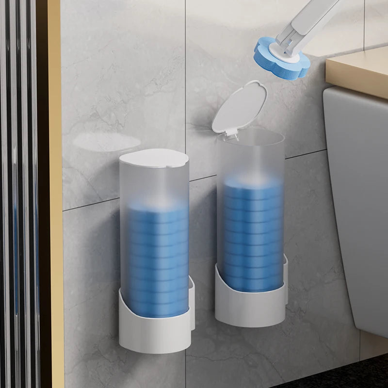 A wall-mounted disposable toilet brush set with a blue brush and holder is displayed on a gray tiled wall.
