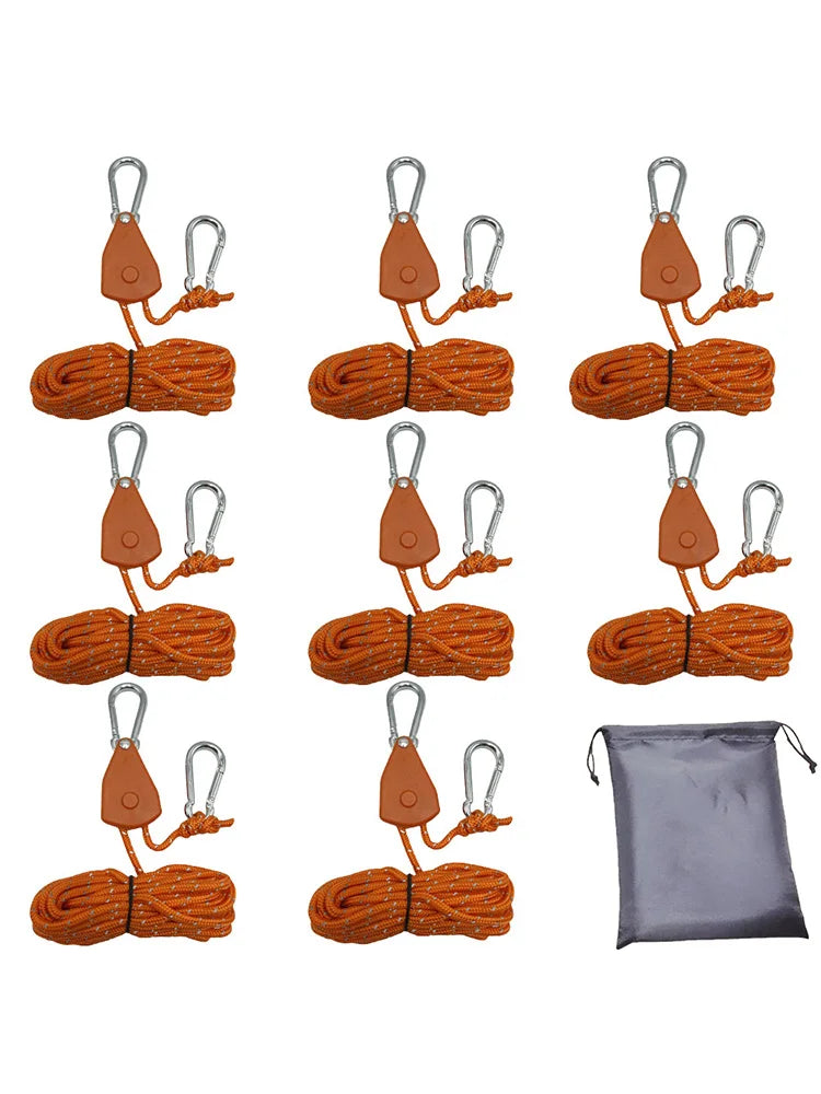 Eight camping rope tensioners with pulley buckles in orange and brown, packaged in a gray pouch.