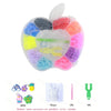 A heart-shaped clear plastic container holding various colored rubber band accessories for bracelet making.