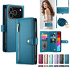 A teal crossbody phone wallet with card slots and zipper closure shown alongside a women's handbag.