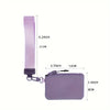 A purple detachable wristlet wallet with a zipper pouch and card slots, shown next to its strap.
