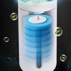 A white wall-mount holder for a blue, textured disposable aromatherapy toilet cleaner with a clear tube.
