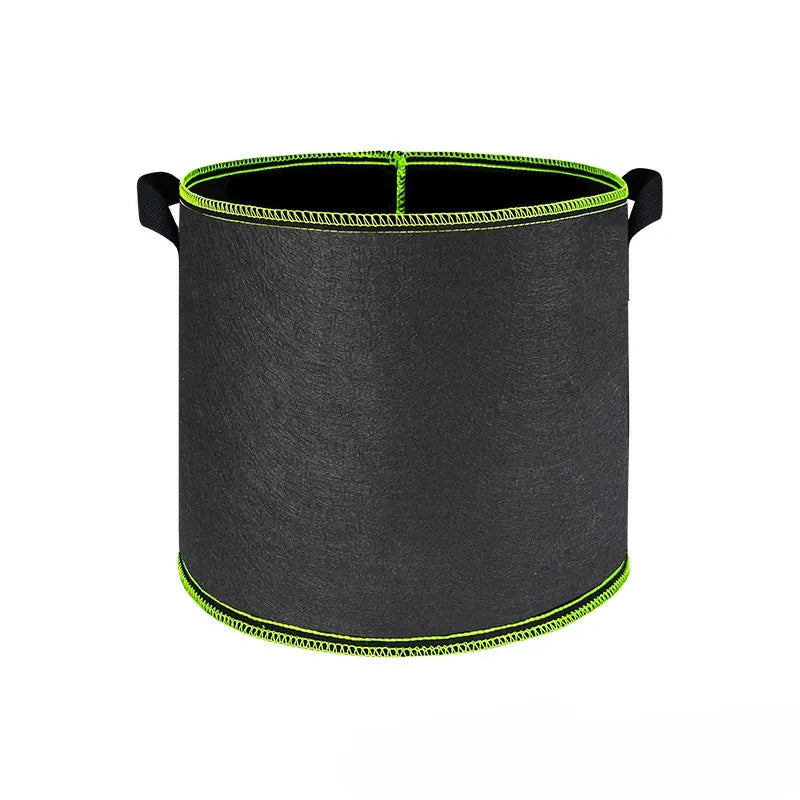 A black heavy-duty non-woven fabric grow bag for gardening plants.