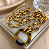 Conjunto de Joyería con Colgante de Leopardo Dorado