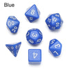 A set of blue polyhedral dice including a d8, d10, d12, d20, and a d4.