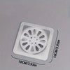 A square white mesh filter designed to catch hair in shower or floor drains, measuring 10cm by 10cm.