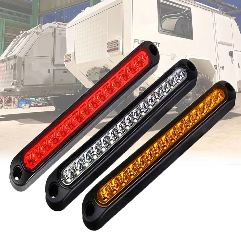 Three LED light bars of different colors mounted on a black bar for trucks and trailers