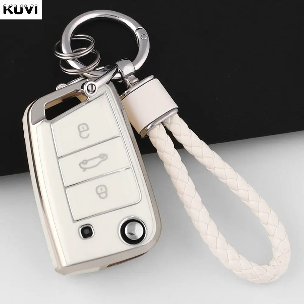 Silver TPU car key fob cover with a keyring attached to a braided cord