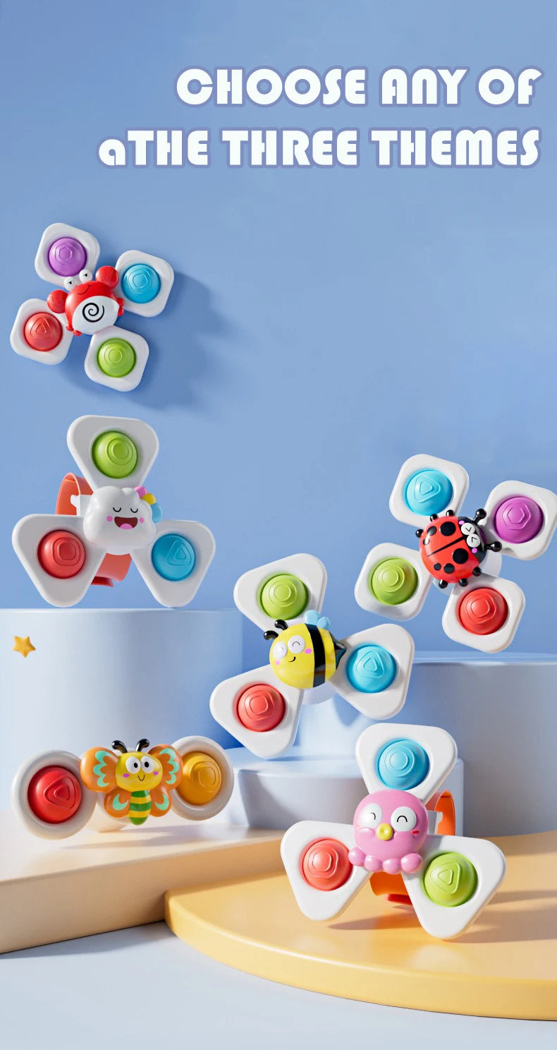 Three colorful spinning bath toys featuring sea creatures like a clownfish, a dolphin, and a bee.