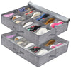 A gray under-bed shoe storage organizer with a clear window holding various pairs of shoes.
