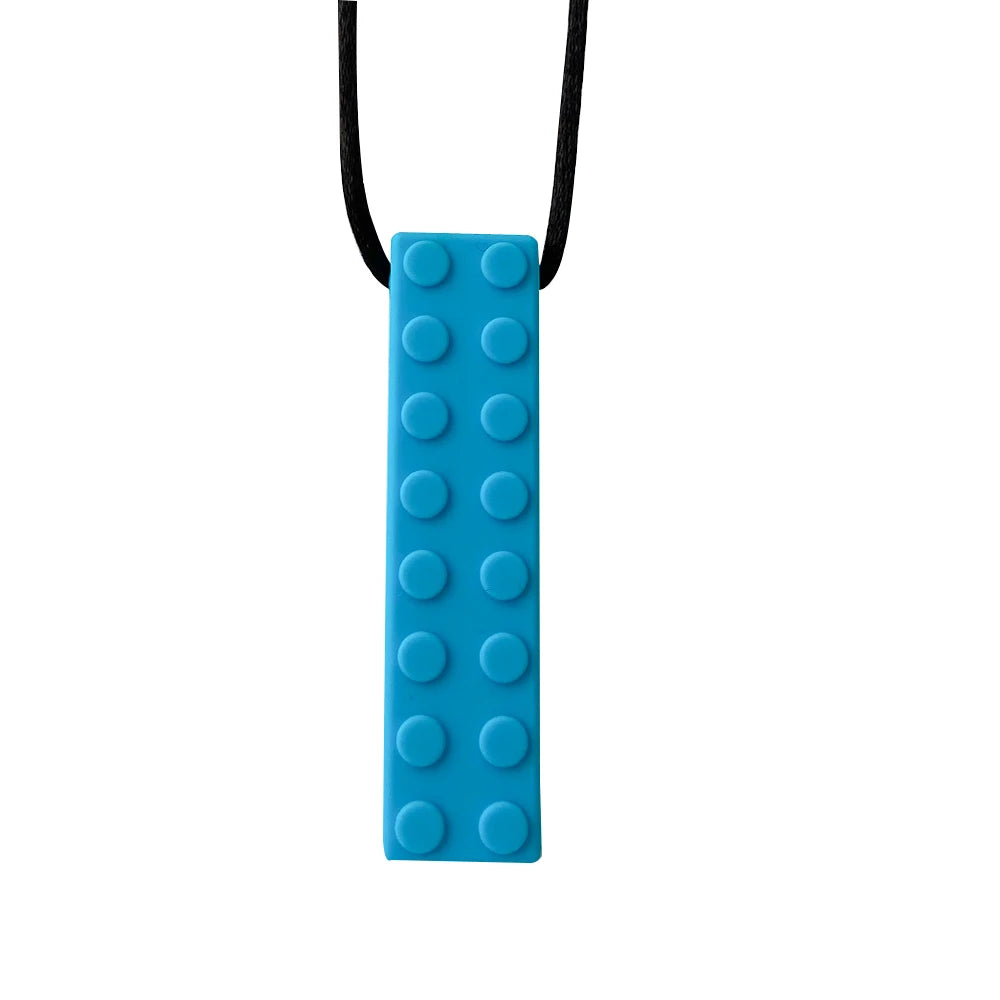 A teal silicone sensory chew necklace pendant with a black cord.
