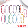 A collection of 10 colorful ball bead chains in various colors and styles laid out for jewelry making.