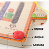 A close-up view of a wooden magnetic color sorting maze board showing various features like the maze design and wooden planks