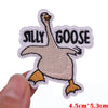 An embroidered iron-on patch featuring a cartoon goose with the text SILLY GOOSE.