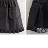 Black Korean style cotton kitchen apron with adjustable neck strap shown flat.