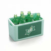 A set of green RC car decorative accessories including surfboard, kayak, and roadblocks.