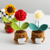 Handmade crochet positive energy plant dolls in various colors like yellow, red, and green.