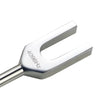 A silver tuning fork with a metal activator, used for sound healing.