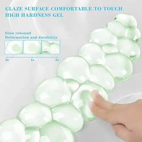 A close-up of a set of translucent, cloud-shaped ergonomic wrist rests made of high-hardness gel.