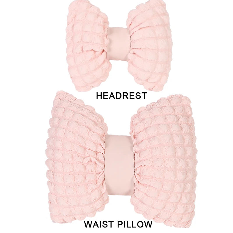 Pink bowknot car neck pillow with lumbar support shown as a headrest and waist pillow