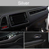 Silver flexible car interior trim strips and dashboard components.