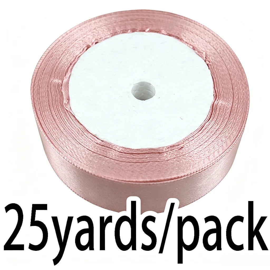 Roll of light pink satin ribbon measuring 25 yards per pack
