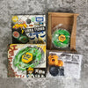 A box and plastic accessory for the Metal Fight Beyblade Rock Leone, including a green blade.