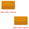 A set of ten yellow 3x8cm high-visibility reflective strip stickers for car safety.