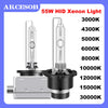 Set of 55W HID Xenon light bulbs with various color temperatures displayed on a black base.