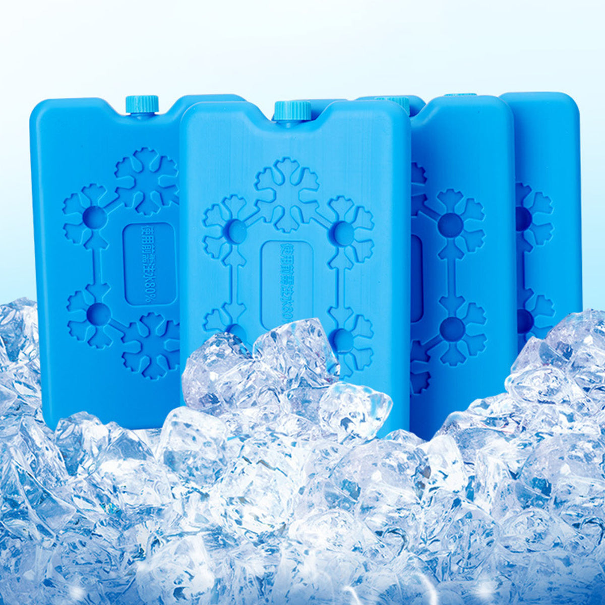 Blue reusable leak-proof ice packs shown surrounded by crushed ice.