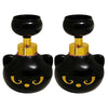 A pair of black and gold foam soap dispensers shaped like cat paws.