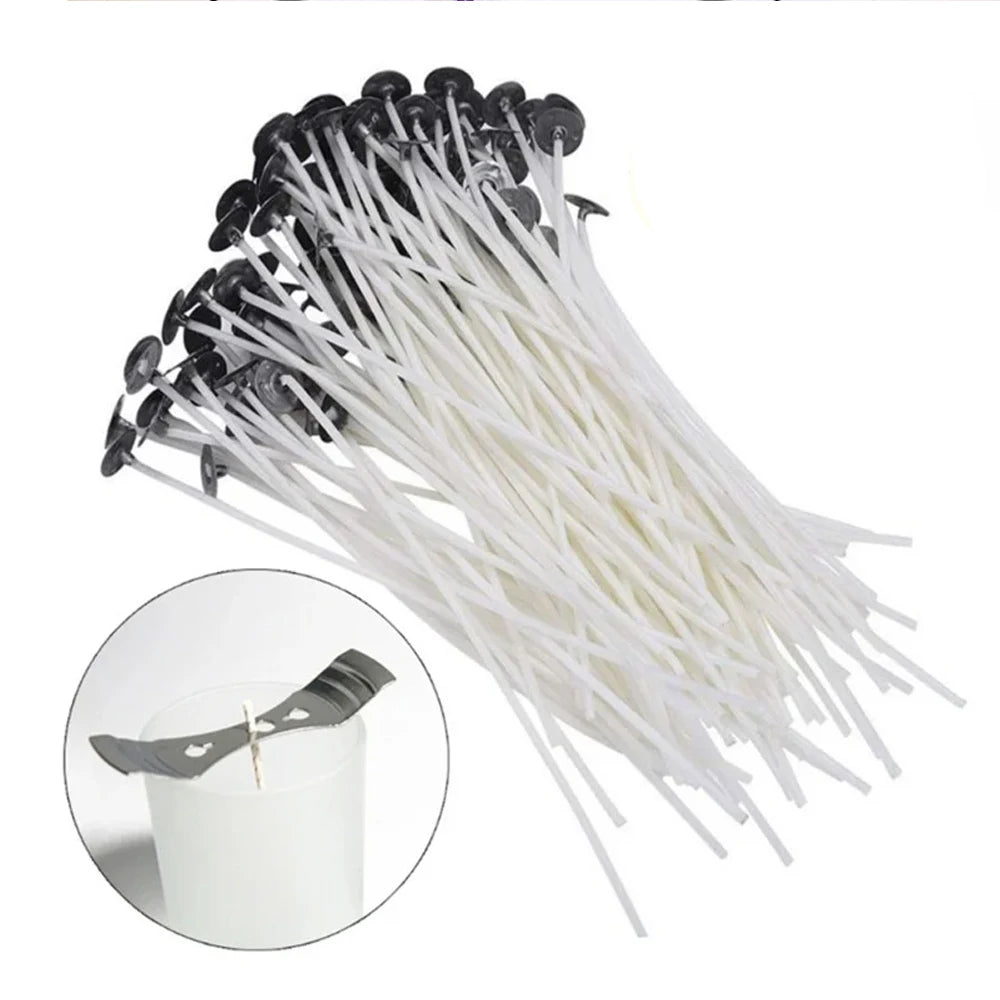A bundle of 53 natural white cotton candle wicks with metal stands arranged diagonally.